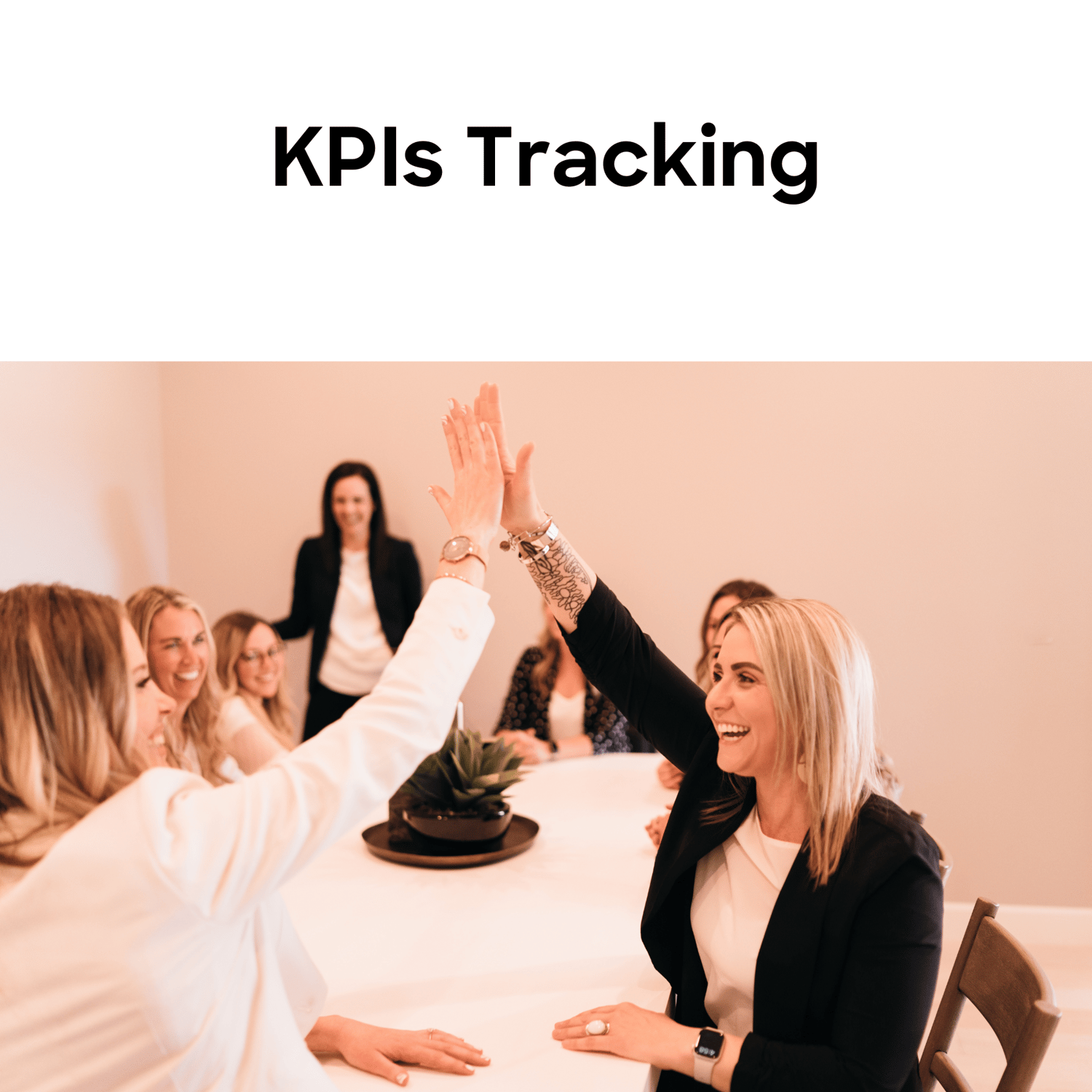KPIs and Tracking- team meeting with team high fiving each other